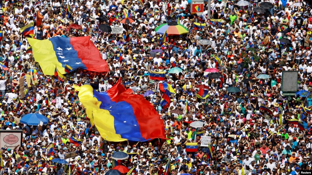 Opposition supporters take part in a rally against Venezuelan President Nicolas Maduro's government in Caracas, Venezuela, Feb. 2, 2019.