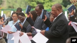 Cabinet Ministers are sworn in at State House in Harare, Zimbabwe, Dec. 4, 2017. 