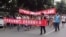 Local residents march during a protest along a street in Shifang, Sichuan province July 3, 2012.