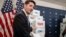 Speaker of the House Paul Ryan, R-Wis., points to boxes of petitions supporting the Republican tax reform bill as he arrives for a news conference on Capitol Hill in Washington, Nov. 14, 2017. 