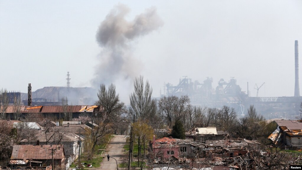 Smoke rises above a plant of Azovstal Iron and Steel Works company in Mariupol