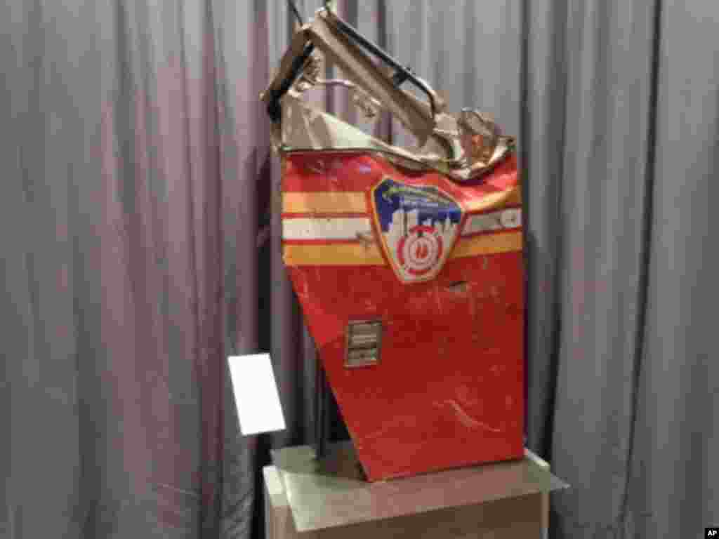 This door is from a New York City Fire Department rescue pumper truck destroyed in the World Trade Center.