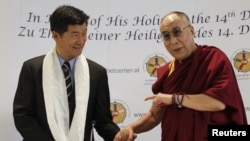 Tibet's exiled spiritual leader the Dalai Lama (R) and Lobsang Sangay, President of the Tibetan government-in-exile