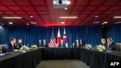 US President Joe Biden, Japanese Prime Minister Shigeru Ishiba and South Korean President Yoon Suk Yeol participate in a trilateral meeting on the sideline of the Asia-Pacific Economic Cooperation (APEC) summit in Lima, Peru, November 15, 2024. (Photo by 