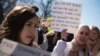 People protest against Trump travel ban outside the White House, Feb. 4, 2017.