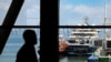 Security personnel guard the entrance to the new Panama Cruise Terminal in Panama City, on March 26, 2024.