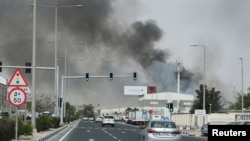 دود ناشی از یکی از حملات موشکی جمهوری اسلامی بر فراز دوحه قطر