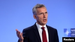 NATO Secretary-General Jens Stoltenberg holds a news conference after a meeting with the ambassadors at the Alliance headquarters in Brussels, Belgium, Nov. 26, 2018.