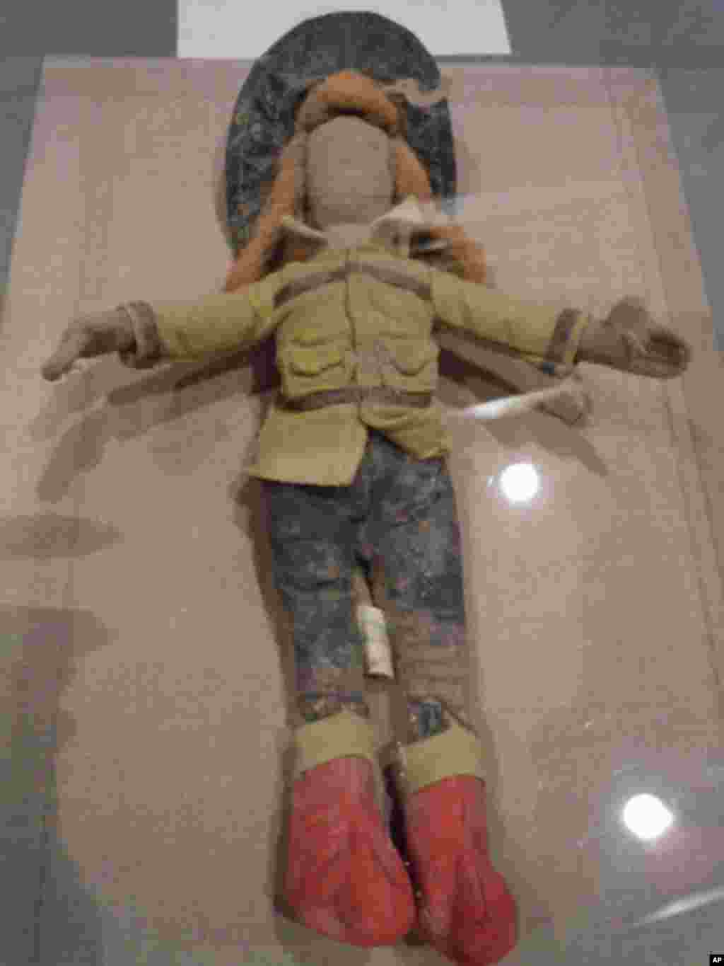 This doll of a female firefighter was recovered from the rubble of the World Trade Center.