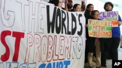 Activistas protestan pidiendo justicia en decisiones climáticas en la cumbre sobre el clima COP29 de la ONU en Bakú, Azerbaiyán, el 15 de noviembre de 2024.