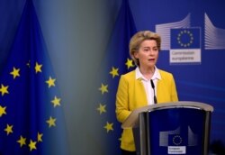 FILE - European Commission President Ursula von der Leyen delivers a statement at EU headquarters in Brussels, April 14, 2021.