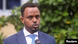 FILE - Somali deputy information minister Abdirahman Yusuf speaks during a news conference in Mogadishu, Somalia, May 6, 2021.
