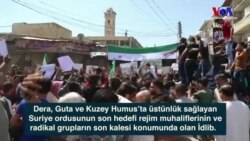 İdlib ve Hama’daki farklı kentlerde binlerce kişi saldırı tehditlerine karşı protesto gösterisi düzenledi