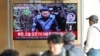 A TV screen shows an image of North Korean leader Kim Jong Un during a news program at the Seoul Railway Station in Seoul, South Korea, Oct. 31, 2024. The letters read, "North Korea launched a new intercontinental ballistic missile today."