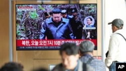 A TV screen shows an image of North Korean leader Kim Jong Un during a news program at the Seoul Railway Station in Seoul, South Korea, Oct. 31, 2024. The letters read, "North Korea launched a new intercontinental ballistic missile today."