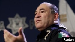 FILE - Enrique Galindo, then-chief of the Mexican Federal Police, speaks at the headquarters of the Federal Police in Mexico City, Mexico, Nov. 26, 2015. 