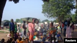 Displaced South Sudanese families are seen in a camp for internally displaced people in the United Nations Mission in South Sudan (UNMISS) compound in Tomping, Juba, South Sudan, July 11, 2016.