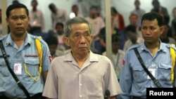 Kaing Guek Eav, seen here in a 2008 file photo, died on Sept. 2, 2020, while serving a life sentence at the Kandal Provincial Correctional Center for crimes against humanity and the deaths of more than 16,000 people in Cambodia’s notorious Killing Fields.