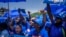 FILE - South African sympathisers of the Democratic Alliance opposition party gather in Pretoria, South Africa, February 17, 2024, for their national manifesto launch in anticipation of the 2024 general elections.