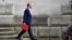 FILE - Britain's Foreign Secretary Dominic Raab leaves the Foreign and Commonwealth Office in central London, July 1, 2020. 