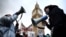 Pro-Palestinian protesters chant slogans in front of Elizabeth Tower, commonly known by the name of the clock's bell, "Big Ben," at the Palace of Westminster, home to parliament, in central London on Jan. 6, 2024. They demanded a cease-fire in the Israel-Hamas war.