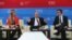 Russia's President Vladimir Putin, center, meets with representatives of G20 Youth Summit, St.Petersburg International Economic Forum, June 20, 2013.