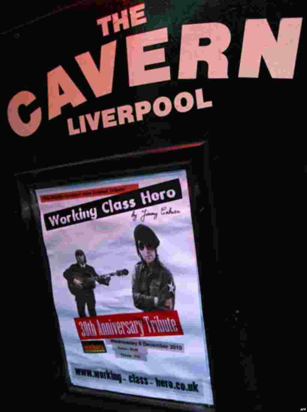 A poster advertising a tribute to John Lennon to be held at the Cavern Club in Mathew Street, Liverpool, England, Wednesday Dec. 8, 2010. Beatles fans will mark the 30th anniversary of John Lennon's death with a candlelit vigil at the city's European Peac