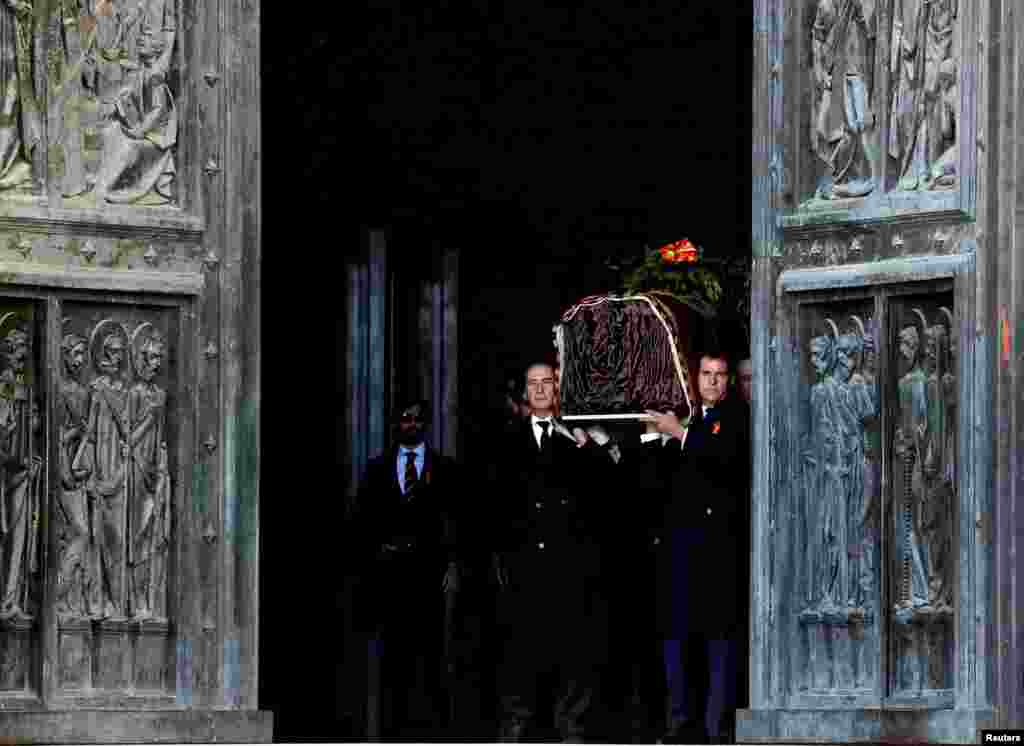 The family members of the late Spanish dictator Francisco Franco carry his coffin at The Valle de los Caidos (The Valley of the Fallen) in San Lorenzo de El Escorial, Spain.
