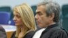 Rachel Lambert, wife of Vincent Lambert, a Frenchman who has been comatose for seven years, attends with her lawyer Laurent Petiti a verdict about her husband in the European Court of Human Rights in Strasbourg, France, June 5, 2015.