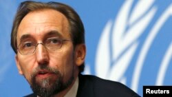 FILE - Jordan's Prince Zeid Ra'ad Zeid al-Hussein, U.N. High Commissioner for Human Rights pauses during a news conference at the United Nations European headquarters in Geneva, Oct. 16, 2014. 