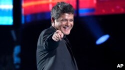 FILE - Alejandro Sanz reacts after winning the award for best contemporary pop vocal album for "Sirope" at the 16th annual Latin Grammy Awards in Las Vegas, Nov. 19, 2015.