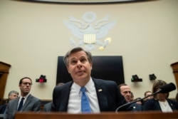 FBI Director Christopher Wray takes his seat to testify during an oversight hearing of the House Judiciary Committee, on Capitol Hill, Feb. 5, 2020 in Washington.