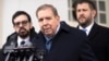 Venezuela's opposition leader Edmundo Gonzalez, center, speaks with reporters at the White House in Washington, Jan. 6, 2025.