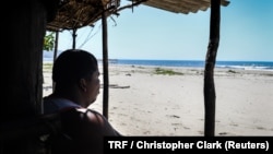 Cesar Benedict, a Garifuna activist and community radio host, looks out to sea in the village of Triunfo de la Cruz, Tela Bay, Honduras, May 5, 2018. 