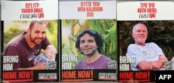 FILE - This combination of pictures created Jan. 31, 2025 shows Israeli hostages Yarden Bibas, left, Ofer Kalderon and Keith Siegel, right, who have been held in the Gaza Strip since the Oct. 7. 2023.