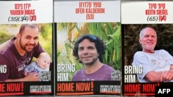 This combination of pictures created Jan. 31, 2025 shows Israeli hostages Yarden Bibas, left, Ofer Kalderon and Keith Siegel, right, who have been held in the Gaza Strip since the Oct. 7. 2023. 