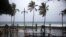 A man exercises under pouring rain during Tropical Storm Isaias in Santo Domingo, Dominican Republic, July 30, 2020. 