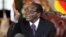 Zimbabwean President Robert Mugabe holds a news conference after the swearing-in of ministers at the State House in Harare, Sept. 11, 2013. 