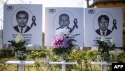 Images of the 125 doctors who have died during the COVID-19 pandemic in Peru are displayed outside Peru's Medical College (CMP) in Lima on Aug. 13, 2020.