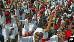 Hundreds of women march during a protest against Senegal's President Abdoulaye Wade's controversial third term bid for presidency, in Dakar, February 24, 2012.