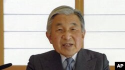 FILE - Emperor Akihito addresses the nation from the Imperial Palace in Tokyo.