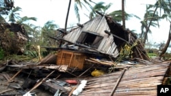 FILE - A house lays in ruins after Cyclone Batsirai in Mananjary, Madagascar, Feb. 10, 2022. Extreme rainfall in Africa's southeast has become heavier and more likely to occur during cyclones because of climate change.