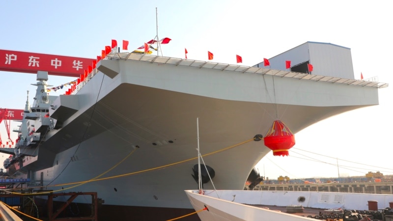 China unveils new assault ship and futuristic fighter jets