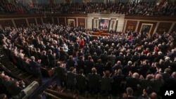 FILE- President Donald Trump delivers his State of the Union address to a joint session of Congress on Capitol Hill in Washington, Jan. 30, 2018.