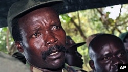 FILE - The leader of the Lord's Resistance Army, Joseph Kony, answers journalists' questions following a meeting with UN officials in southern Sudan, November 2006.