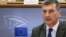 FILE - Andrus Ansip addresses the European Parliament's Committee on the Internal Market and Consumer Protection at the EU Parliament in Brussels, Oct. 6, 2014. 