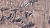 FILE - This satellite photo from Planet Labs PBC shows damaged buildings at Iran's Parchin military base outside of Tehran, Oct. 27, 2024.