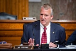 FILE - Sen. Dan Sullivan, R-Alaska, testifies during a hearing on Capitol Hill in Washington, May 7, 2020.