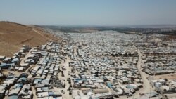 Millions of people are displaced in Idlib, northwestern Syria, and aid organizations say if COVID-19 becomes widespread, mortality rates will be 'drastically higher' in these camps than in other places, in Idlib, Syria, July 24, 2020.