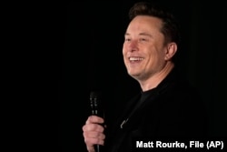 FILE - Elon Musk speaks as part of a campaign town hall in support of Republican presidential nominee former President Donald Trump in Folsom, Pa., Thursday, Oct. 17, 2024.